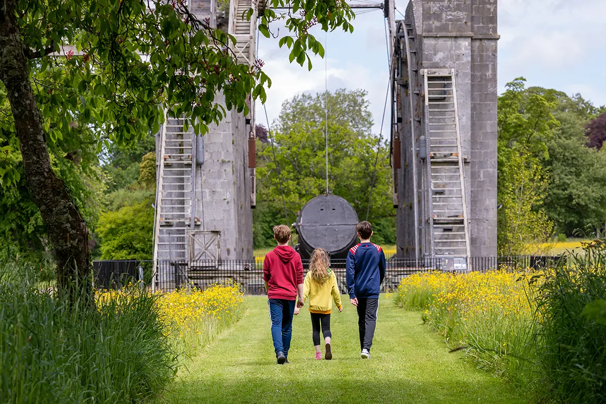 Kids Walking Towards Telescope