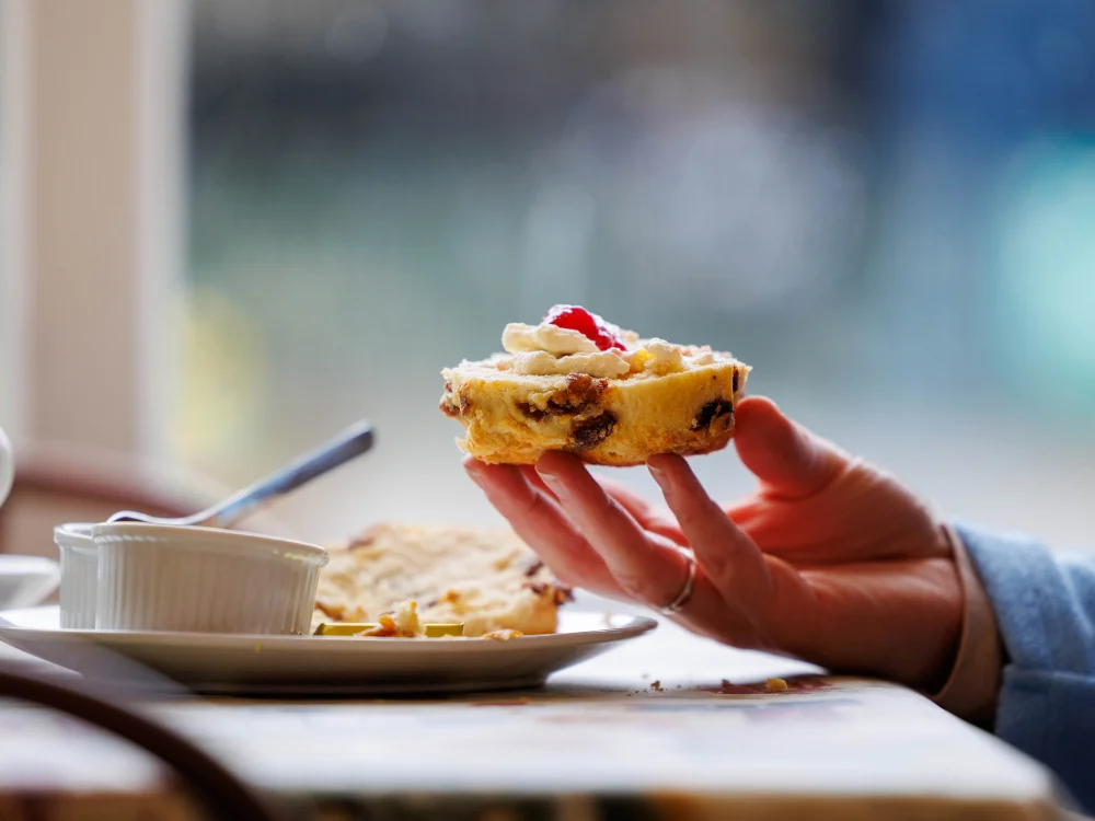 Courtyard Cafe Scone in hand